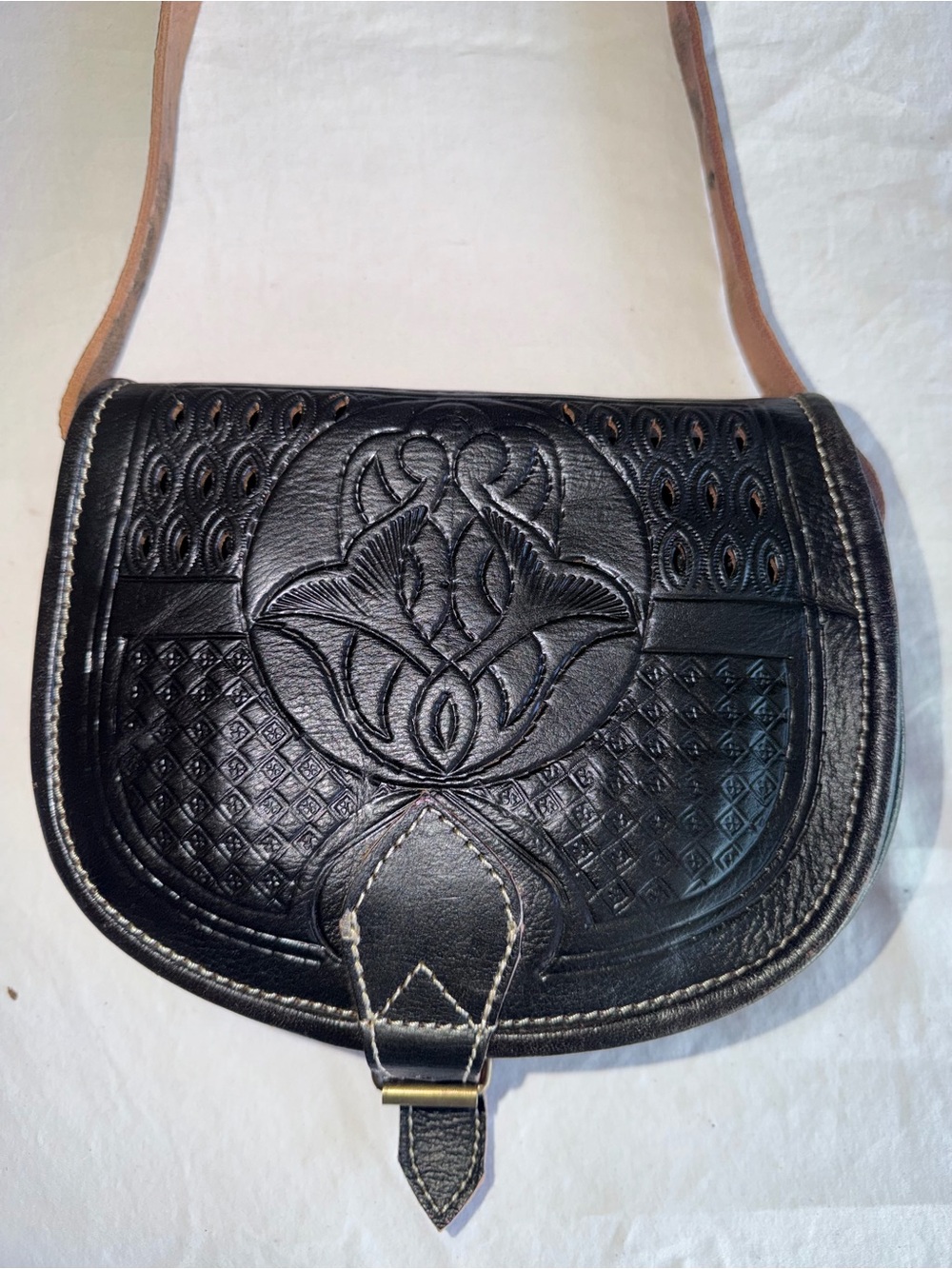Hand-Tooled Black Leather Crossbody Bag with Floral Motif
